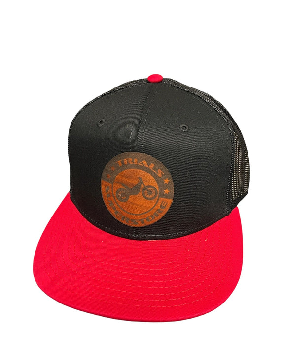 Trials Superstore Circle Leather Patch Flat Bill Trucker Hat