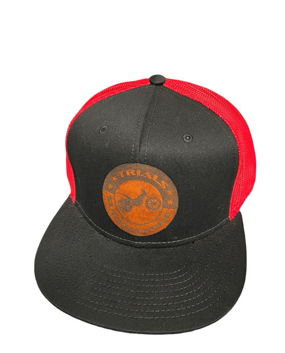 Trials Superstore Circle Leather Patch Flat Bill Trucker Hat