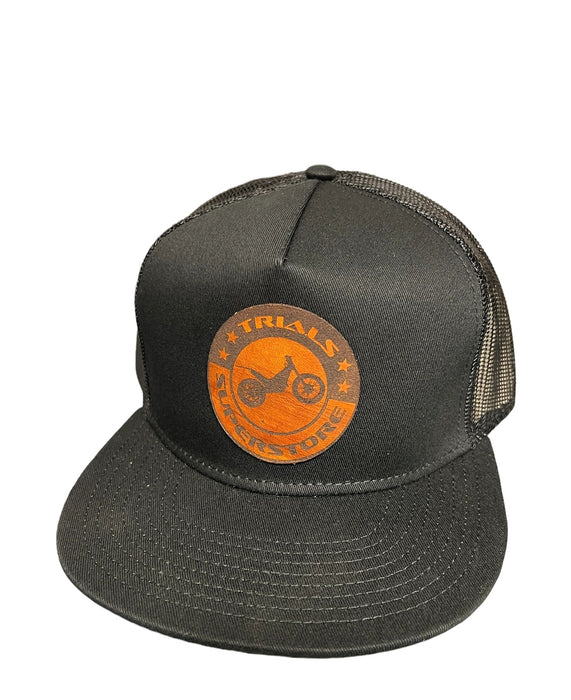 Trials Superstore Circle Leather Patch Flat Bill Trucker Hat